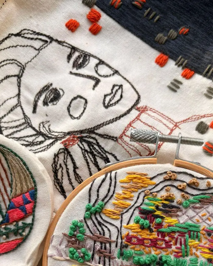 Embroidered pieces in different techniques, among them sewing machine embroidery and slow stitch