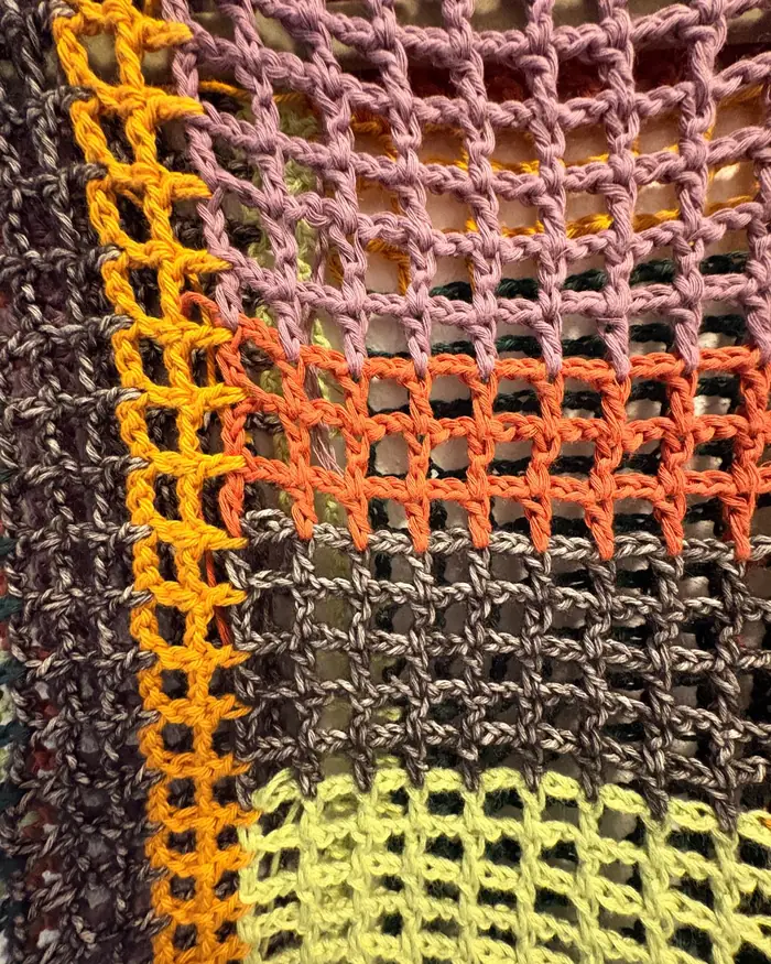 Macro of striped open mesh crochet