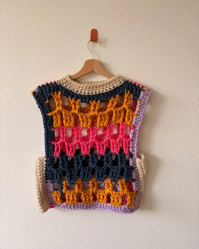 The Tropix vest hanging on a wall, one side
